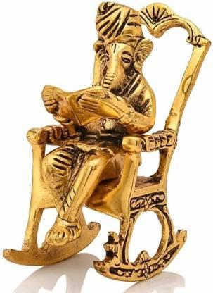 Golden Ganesha Showpiece – Lord Ganesha on Rocking Chair Reading Ramayan